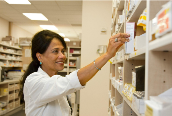 A pharmacist looking for medication